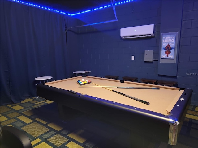 2121 Morocco Way, Kissimmee, FL 34747 - playroom featuring a wall mounted AC, billiards table, and concrete block wall