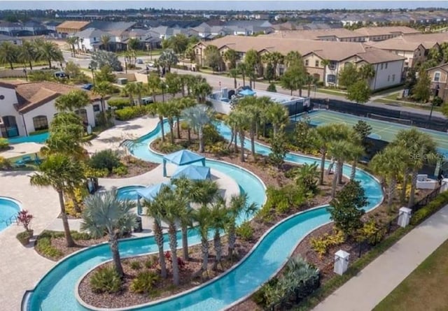 2121 Morocco Way, Kissimmee, FL 34747 - aerial perspective of suburban area featuring a pool area