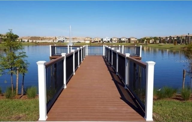 2121 Morocco Way, Kissimmee, FL 34747 - dock area featuring a residential view and a water view