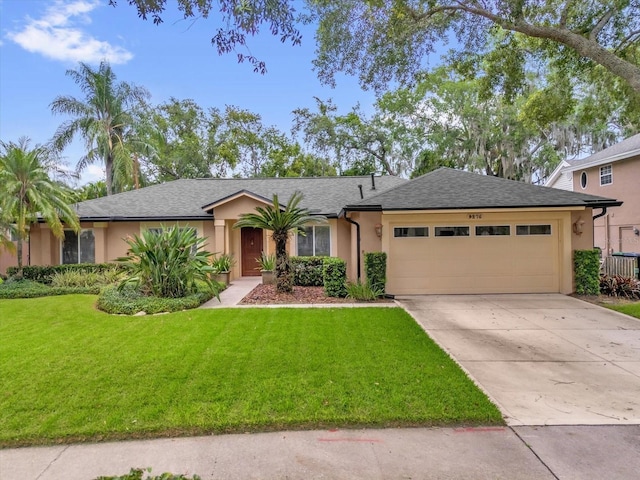9275 Lake Sharp Ct, Orlando, FL 32817 - ranch-style house featuring an attached garage, stucco siding, a front yard, driveway, and a shingled roof