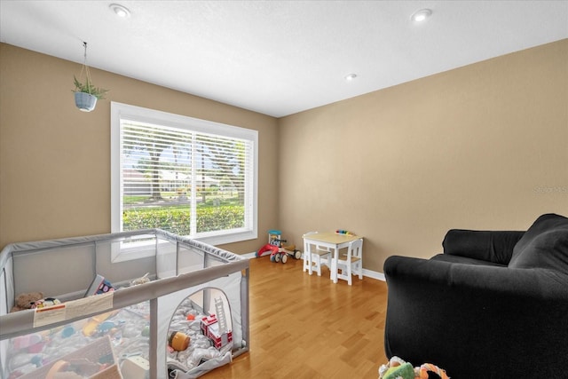 9275 Lake Sharp Ct, Orlando, FL 32817 - playroom with light wood-type flooring and recessed lighting
