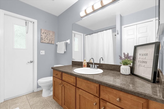 9275 Lake Sharp Ct, Orlando, FL 32817 - full bathroom with vanity and tile patterned floors