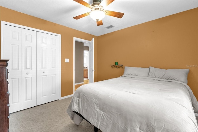 9275 Lake Sharp Ct, Orlando, FL 32817 - carpeted bedroom with a closet and a ceiling fan