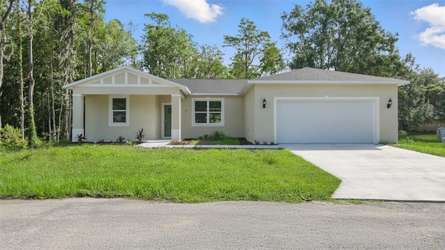 17 Cypress Run, Haines City, FL 33844 - ranch-style home with stucco siding, an attached garage, concrete driveway, and a front lawn