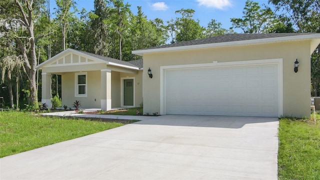 17 Cypress Run, Haines City, FL 33844 - view of front facade with stucco siding, concrete driveway, an attached garage, and a front yard