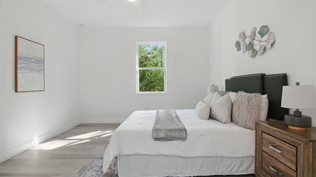 17 Cypress Run, Haines City, FL 33844 - bedroom with light wood-type flooring and baseboards