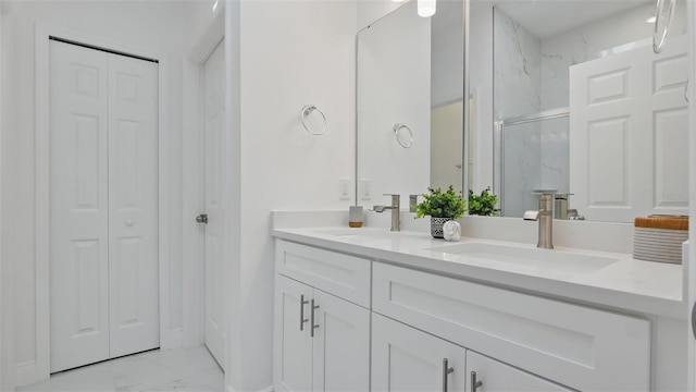 17 Cypress Run, Haines City, FL 33844 - full bath with a closet, marble finish flooring, double vanity, and a marble finish shower