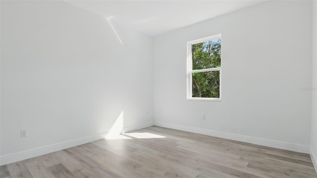 17 Cypress Run, Haines City, FL 33844 - unfurnished room with light wood-type flooring
