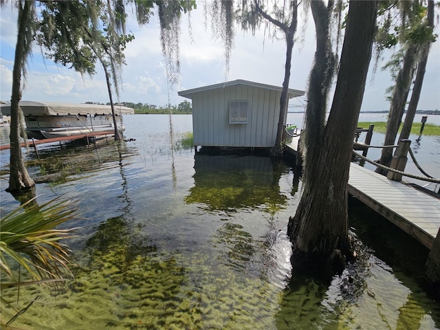 606 Butler St, Windermere, FL 34786 - dock featuring a water view and boat lift