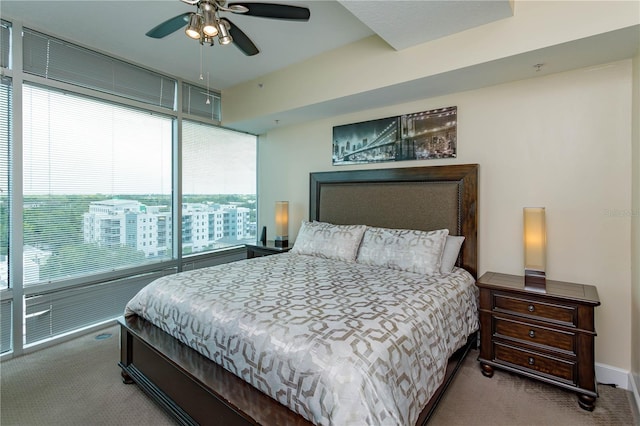 101 S Eola Dr Unit 1021, Orlando, FL 32801 - bedroom featuring carpet floors and a ceiling fan