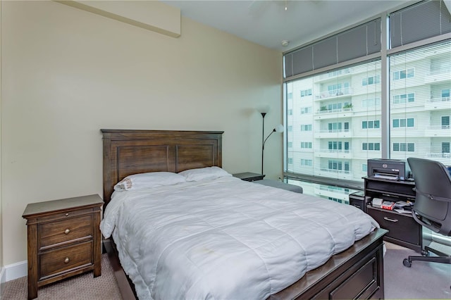 101 S Eola Dr Unit 1021, Orlando, FL 32801 - carpeted bedroom featuring an office area