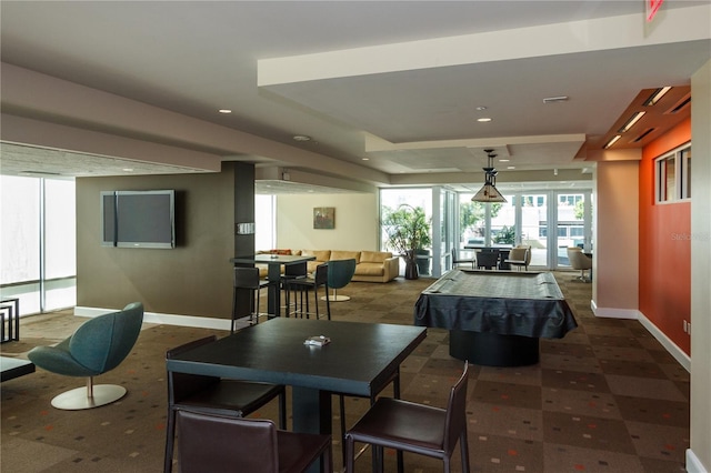 101 S Eola Dr Unit 1021, Orlando, FL 32801 - carpeted dining space featuring a tray ceiling and recessed lighting