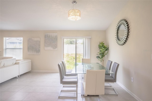 561 Andrea Cir S, Haines City, FL 33844 - tiled dining area with baseboards