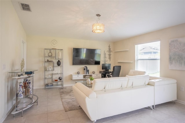 561 Andrea Cir S, Haines City, FL 33844 - living room featuring light tile patterned floors and a desk