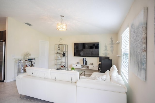 561 Andrea Cir S, Haines City, FL 33844 - living area featuring light tile patterned floors