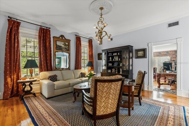 8407 Interbay Blvd, Tampa, FL 33616 - sitting room featuring hardwood / wood-style floors, a chandelier, and an office area
