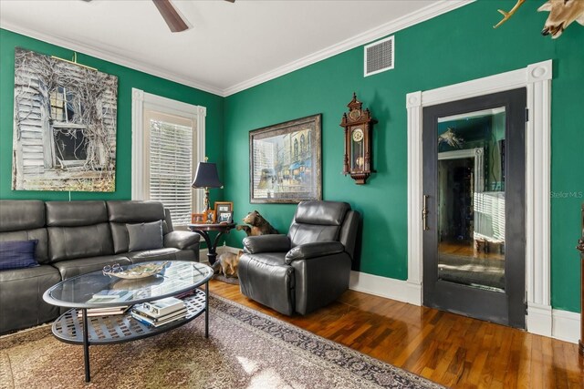 8407 Interbay Blvd, Tampa, FL 33616 - living area featuring wood finished floors, ornamental molding, and ceiling fan