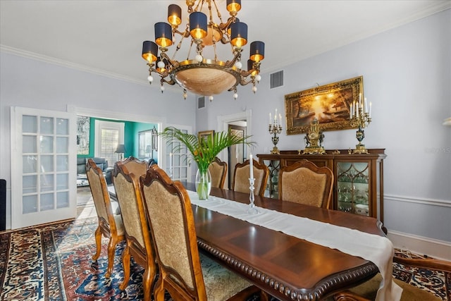 8407 Interbay Blvd, Tampa, FL 33616 - dining area with a chandelier and ornamental molding