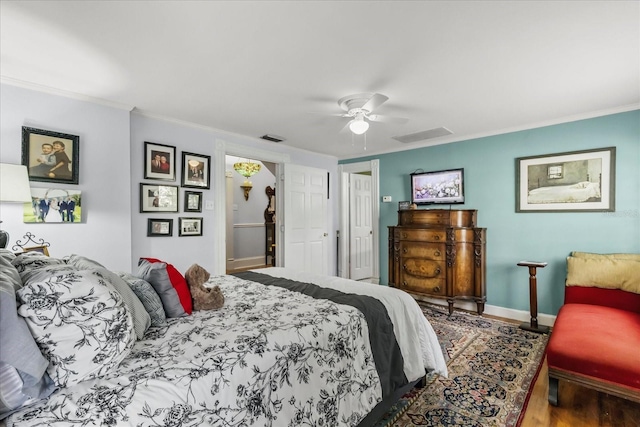 8407 Interbay Blvd, Tampa, FL 33616 - bedroom with wood finished floors, ornamental molding, and a ceiling fan
