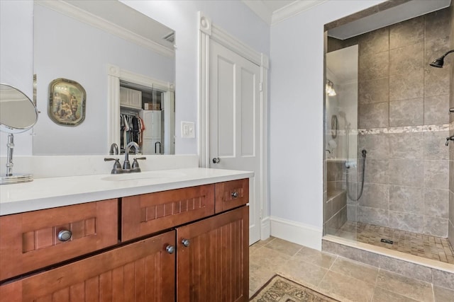 8407 Interbay Blvd, Tampa, FL 33616 - full bath featuring ornamental molding, a tile shower, vanity, a spacious closet, and tile patterned floors