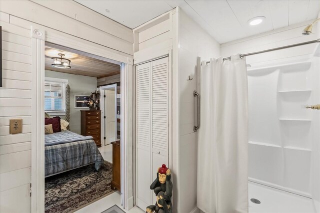 8407 Interbay Blvd, Tampa, FL 33616 - bathroom featuring a closet, a stall shower, and ensuite bathroom