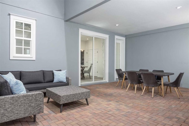 2386 Celebration Blvd, Celebration, FL 34747 - living area featuring recessed lighting and brick patterned floors