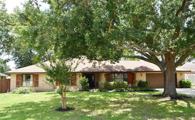 26 Canter Club Ct, Debary, FL 32713 - view of front of property with a garage, brick siding, and roof with shingles