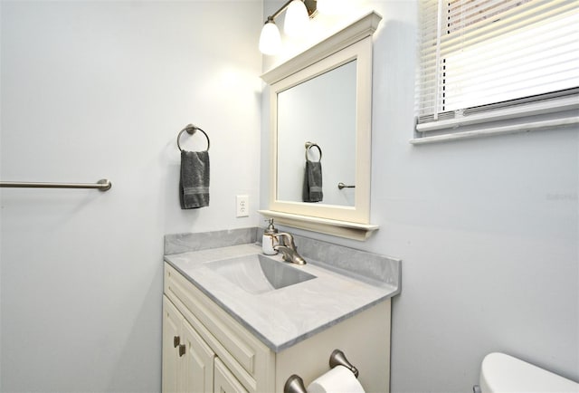 26 Canter Club Ct, Debary, FL 32713 - bathroom featuring vanity and toilet