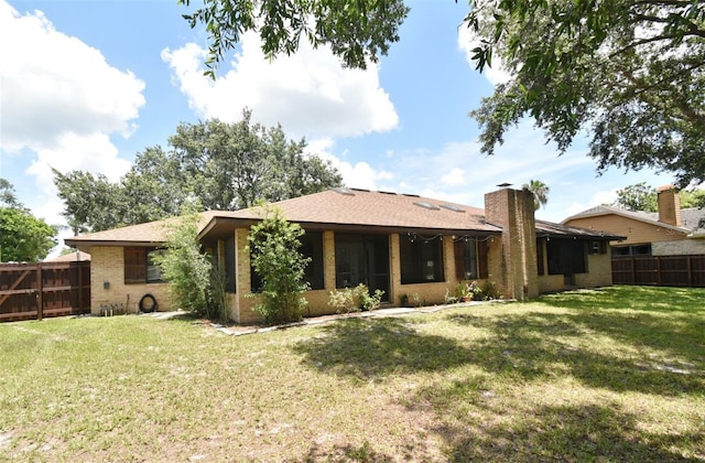 26 Canter Club Ct, Debary, FL 32713 - rear view of house featuring brick siding and a chimney