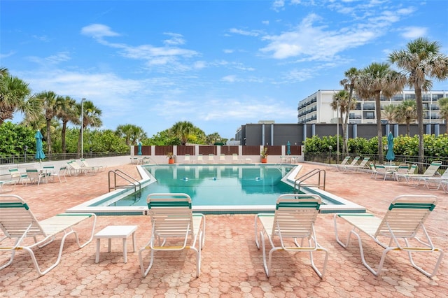 2100 N Atlantic Ave Unit 1110, Cocoa Beach, FL 32931 - community pool with a patio area