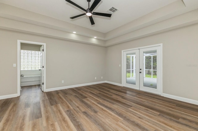 1660 Justin Matthew Way, Saint Cloud, FL 34771 - empty room with french doors, wood finished floors, a ceiling fan, and recessed lighting