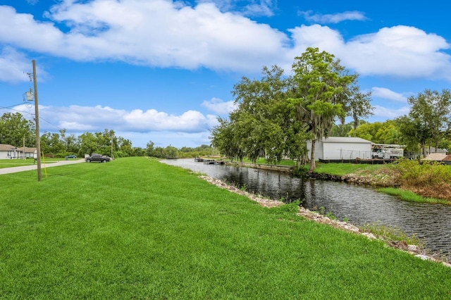 1660 Justin Matthew Way, Saint Cloud, FL 34771 - view of grassy yard featuring a water view