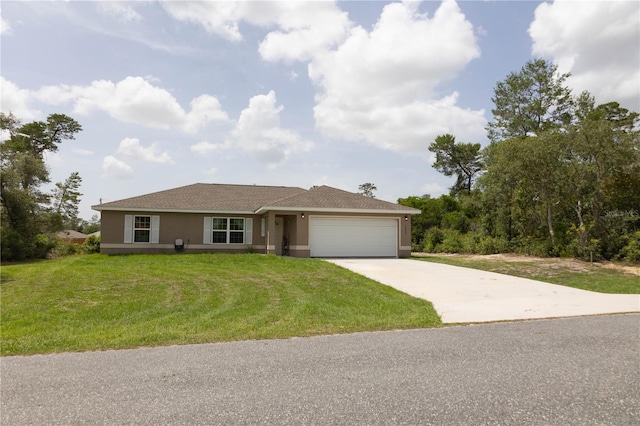 16863 SW 29th Terrace Rd, Ocala, FL 34473 - view of front of property with a garage, driveway, a front yard, and stucco siding