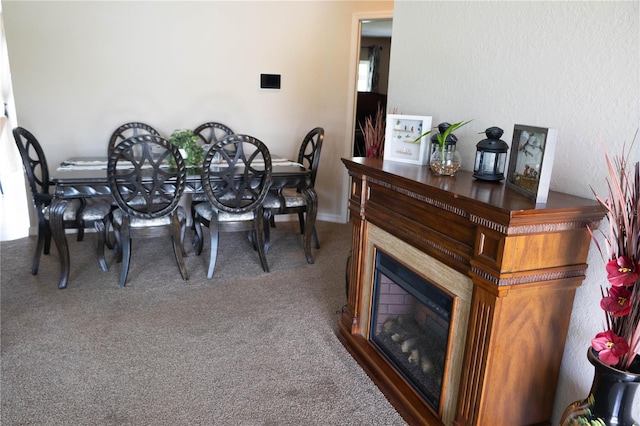 16863 SW 29th Terrace Rd, Ocala, FL 34473 - carpeted dining area featuring a glass covered fireplace