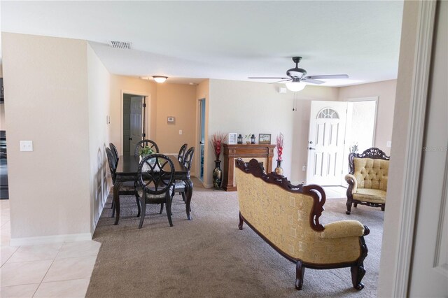 16863 SW 29th Terrace Rd, Ocala, FL 34473 - living area featuring ceiling fan, light colored carpet, and light tile patterned floors