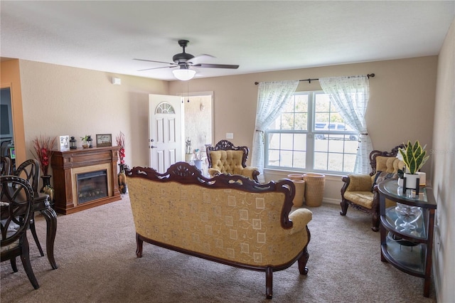16863 SW 29th Terrace Rd, Ocala, FL 34473 - carpeted living area with a ceiling fan and a glass covered fireplace