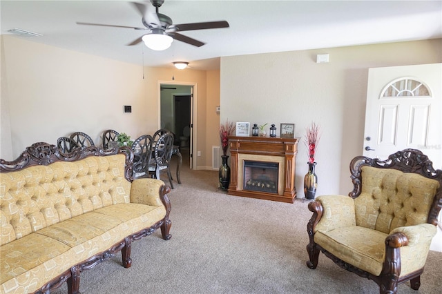 16863 SW 29th Terrace Rd, Ocala, FL 34473 - carpeted living room with ceiling fan and a fireplace