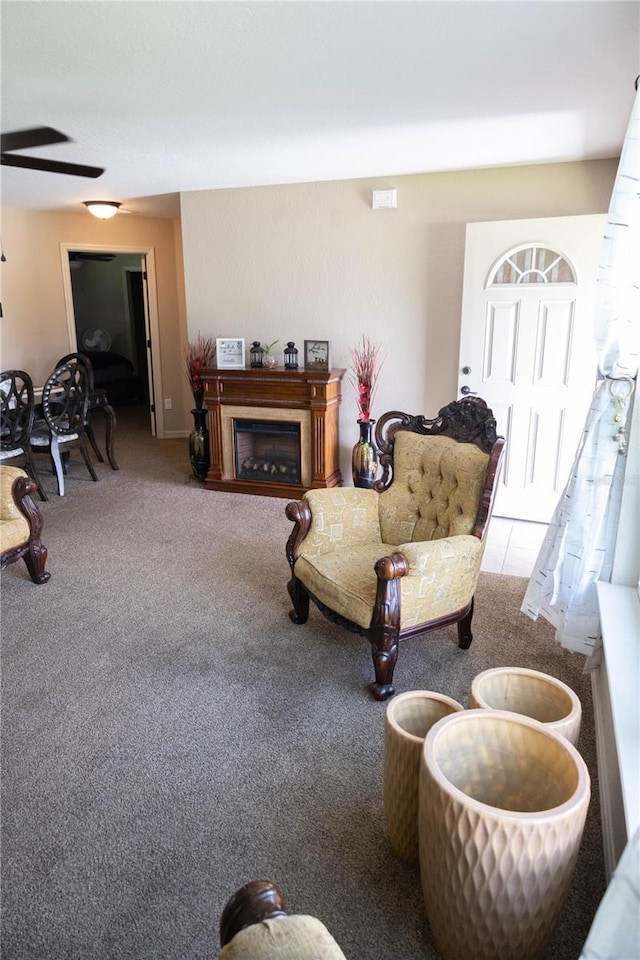 16863 SW 29th Terrace Rd, Ocala, FL 34473 - living area featuring carpet floors, ceiling fan, and a fireplace