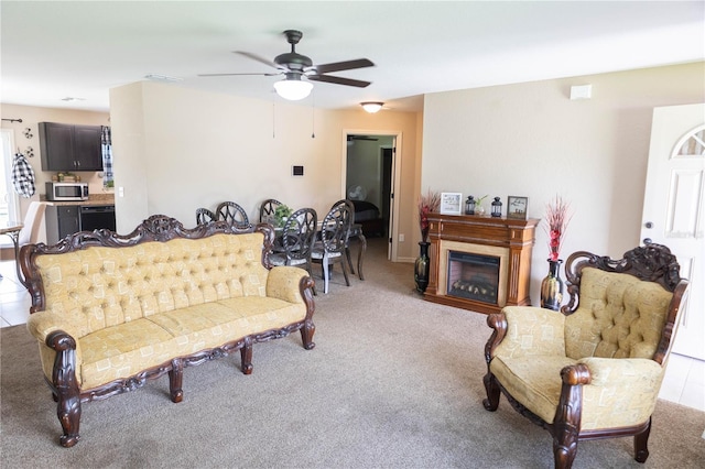 16863 SW 29th Terrace Rd, Ocala, FL 34473 - carpeted living room with a ceiling fan and a fireplace