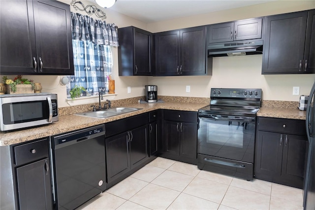16863 SW 29th Terrace Rd, Ocala, FL 34473 - kitchen featuring under cabinet range hood, black appliances, light tile patterned flooring, dark cabinetry, and light countertops