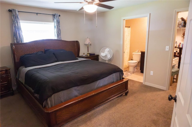 16863 SW 29th Terrace Rd, Ocala, FL 34473 - bedroom featuring carpet floors, ensuite bathroom, and ceiling fan