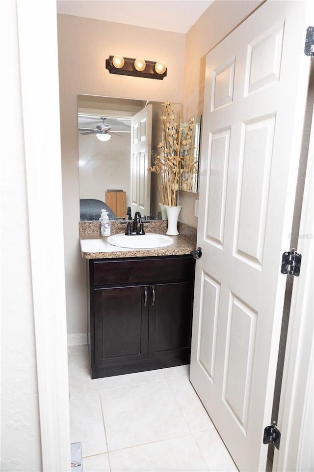 16863 SW 29th Terrace Rd, Ocala, FL 34473 - bathroom with vanity, tile patterned flooring, and ceiling fan