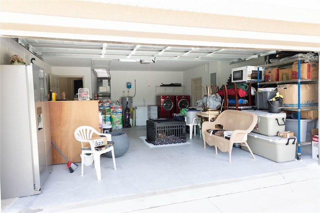 16863 SW 29th Terrace Rd, Ocala, FL 34473 - garage featuring washing machine and dryer and freestanding refrigerator