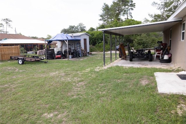 16863 SW 29th Terrace Rd, Ocala, FL 34473 - view of yard with a storage unit and a carport