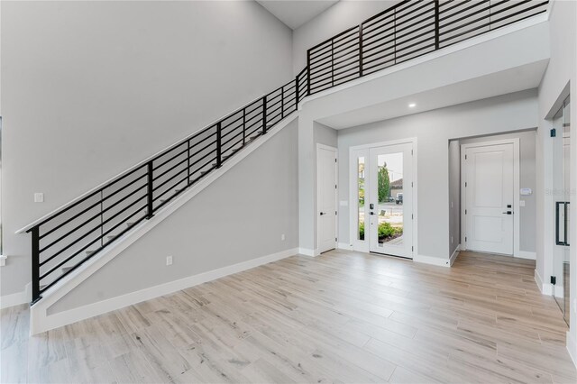 15942 Vetta Dr, Bella Collina, FL 34756 - entryway with stairway, wood finished floors, and recessed lighting