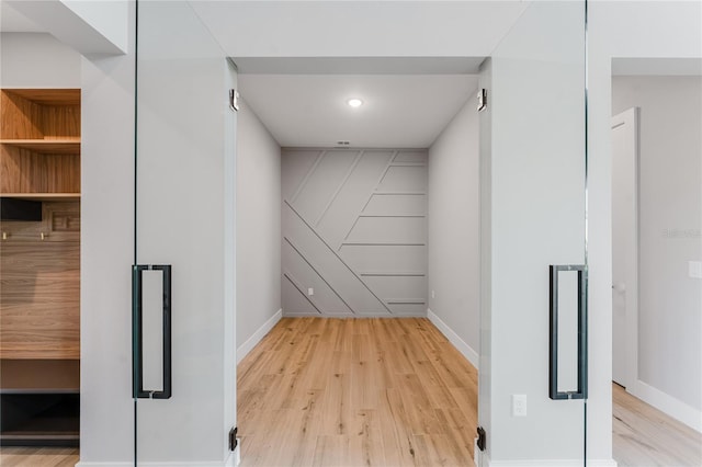 15942 Vetta Dr, Bella Collina, FL 34756 - hallway featuring light wood finished floors and recessed lighting