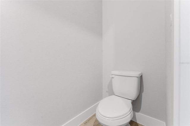 15942 Vetta Dr, Bella Collina, FL 34756 - bathroom with baseboards and toilet