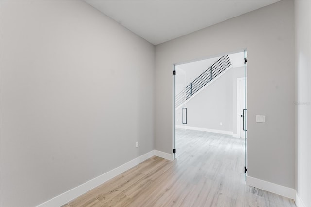 15942 Vetta Dr, Bella Collina, FL 34756 - empty room with light wood-type flooring and baseboards