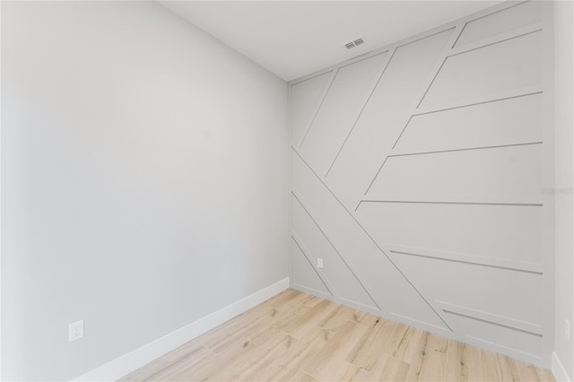 15942 Vetta Dr, Bella Collina, FL 34756 - empty room featuring light wood-style floors and baseboards