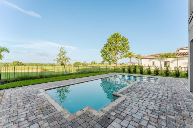 15942 Vetta Dr, Bella Collina, FL 34756 - view of swimming pool with a patio and a fenced backyard
